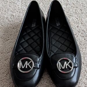 Michael Kors Lillie Black Leather Flats with Silver Logo. New Without Box